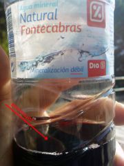 Винище в бутыли из-под воды. Минерелезейшн дебил!