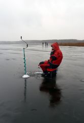 Поповцев в знаменитом красном комбезе